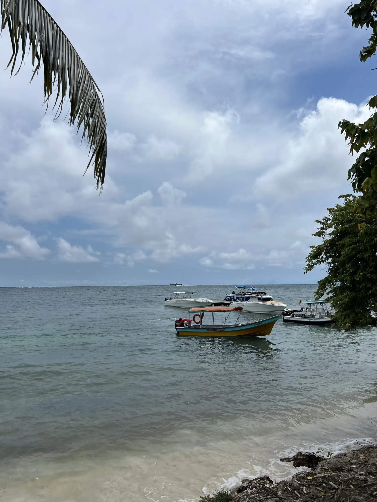 Boats moored off the beach