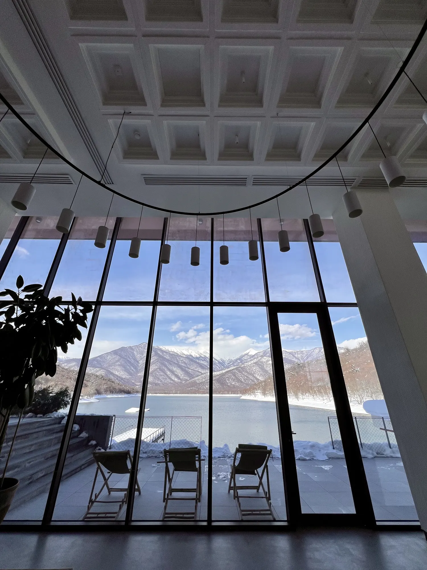 Deckchairs on the terrace, seen from inside