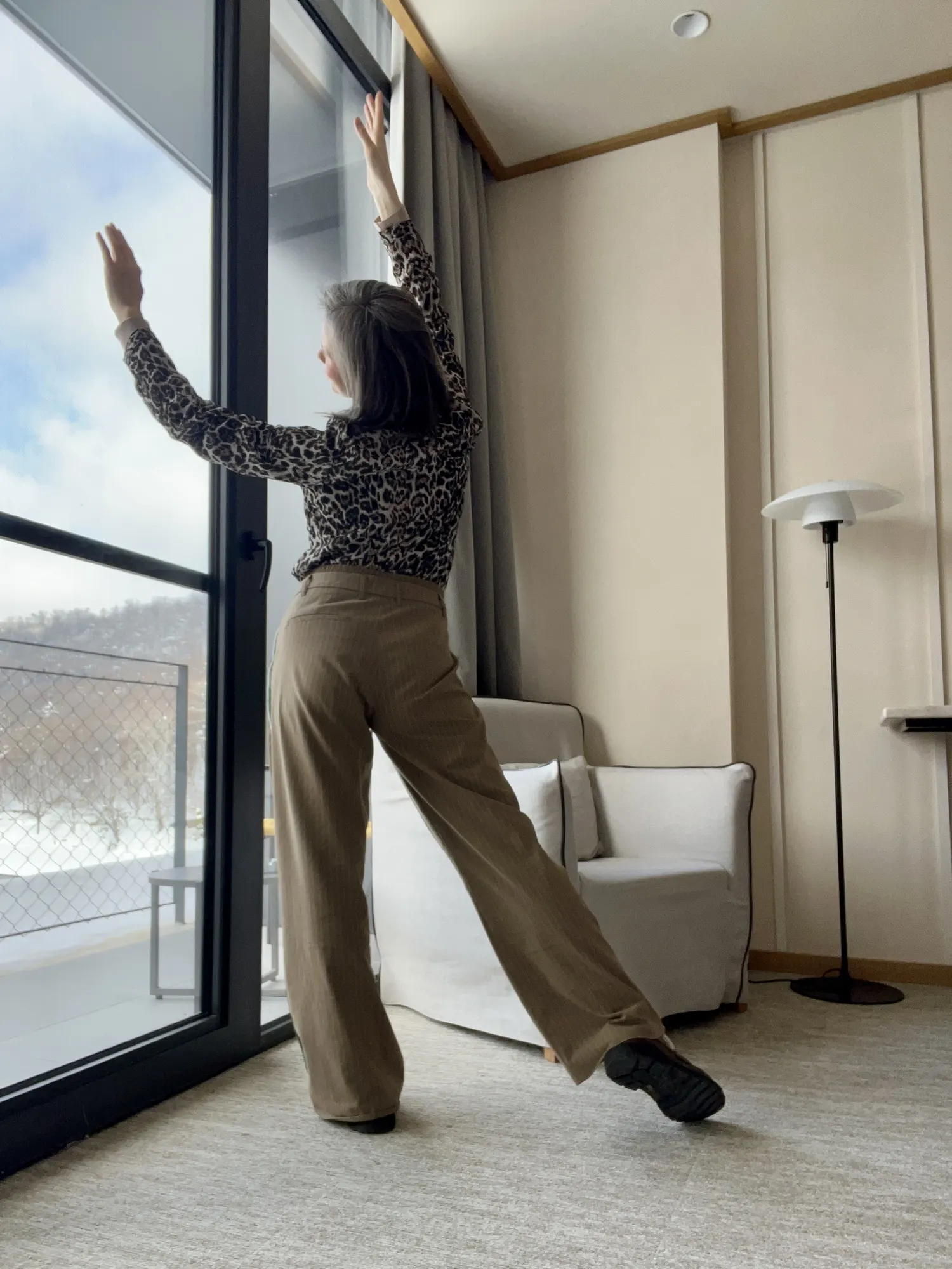 Morning stretch at the window